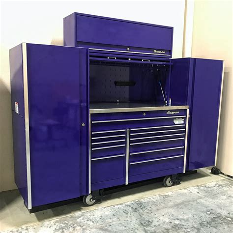 All of the drawers have the finger latch to open with protection from accidental opening. . Snap on purple tool box